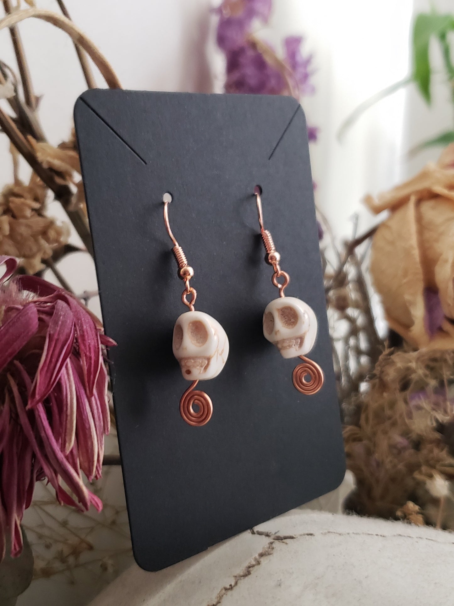 Spiral Out Stone Skull Earrings